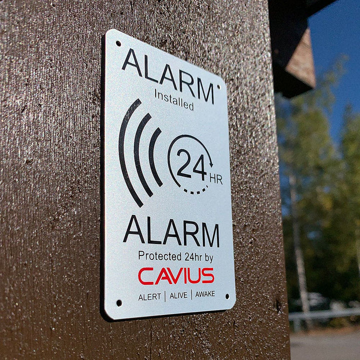 Larmskylt och stickers Cavius
