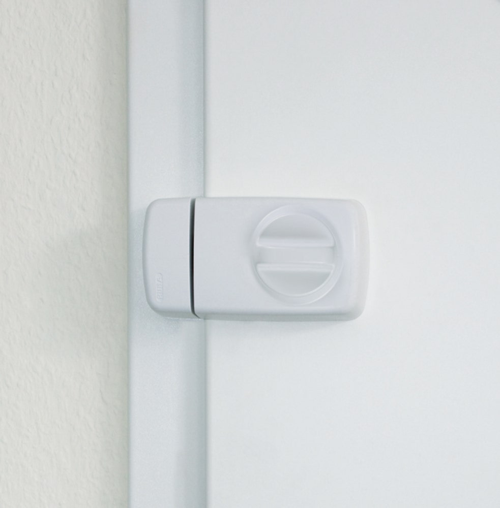 Utanpåliggande dörrlås ABUS 7010 Vit monterat på dörr